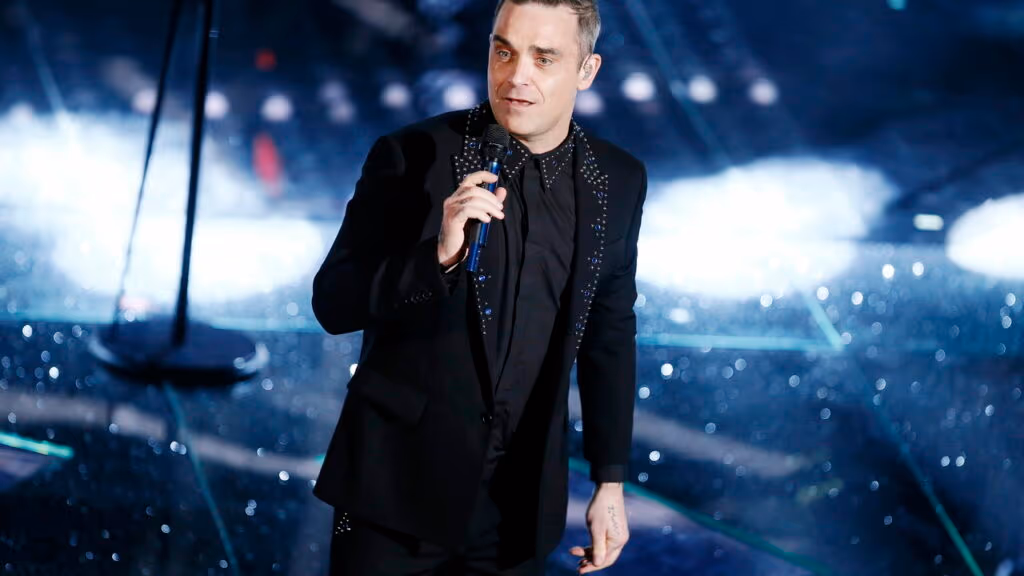 Robbie Williams revela que fotos com fãs o deixam ansioso