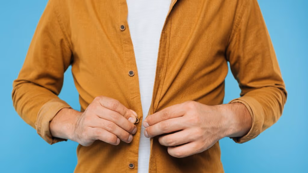 Por que homens e mulheres não abotoam as roupas da mesma forma?