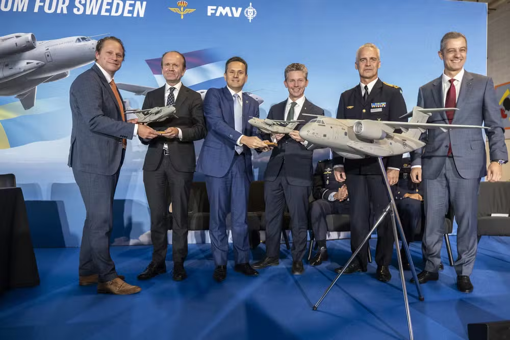 Cerimônia em Uppsala, onde o acordo foi fechado - Reprodução/Embraer