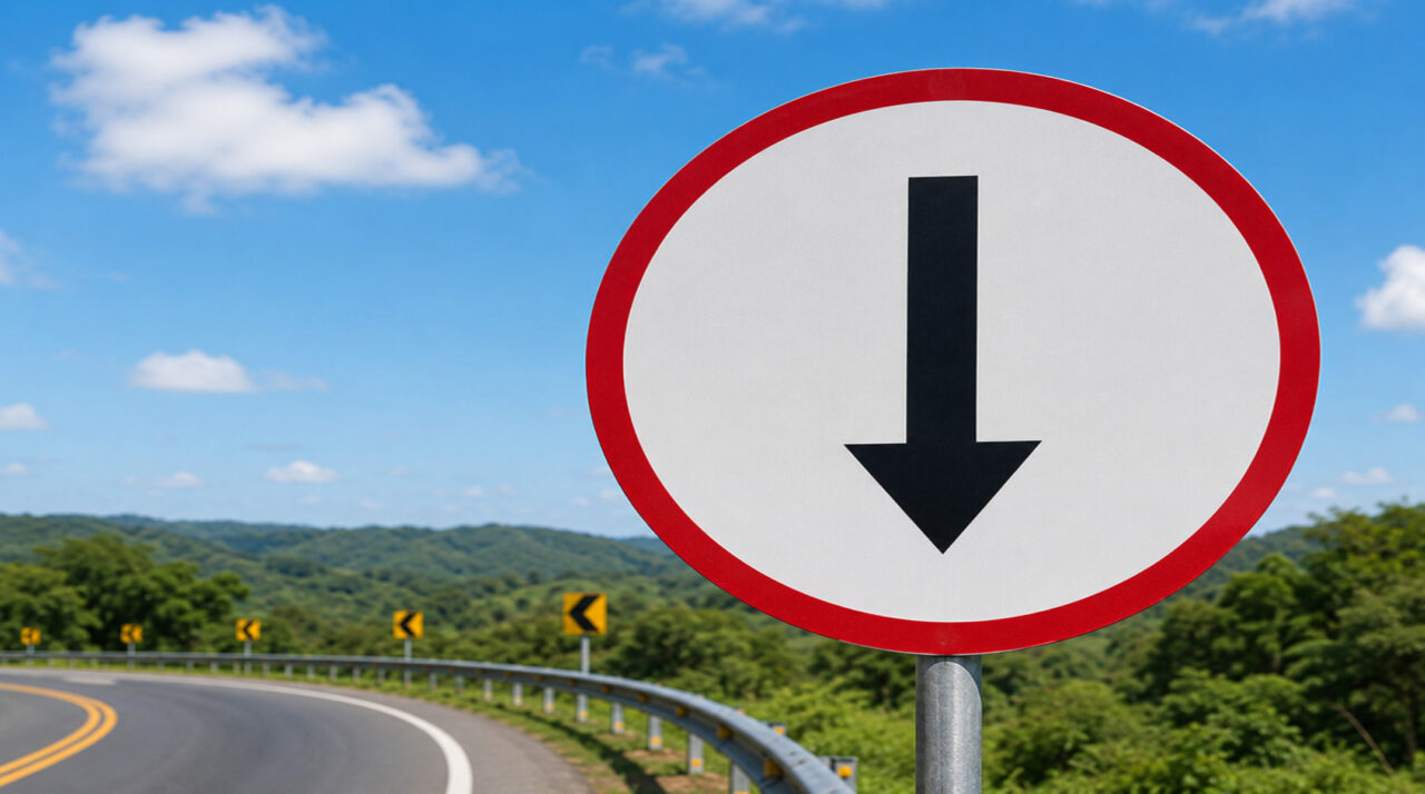 O que significa a placa de trânsito com uma seta apontando para baixo e o fundo branco?