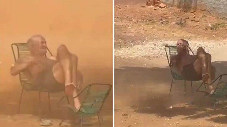 Zezé, de 80 anos, sentado na cadeira enquanto o redemoinho de areia passa por ele no Piauí